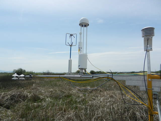 Radiometers, eddy sensors, and RH/T sensor over a mostly brown wetland
