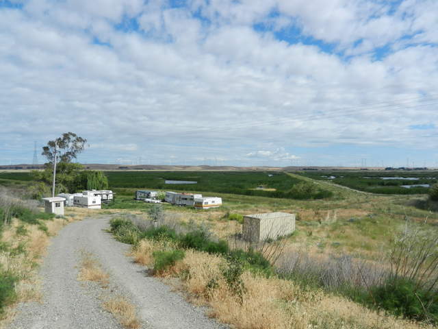 Trailers just off of the gravel levee road