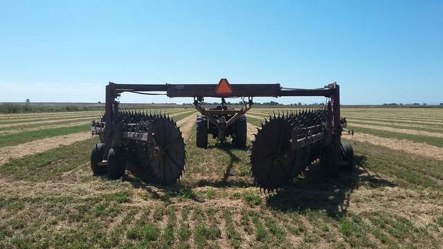 Hay rake parked at Bouldin Alfalfa and ready to flip/turn the mown hay into a more narrow windrow.