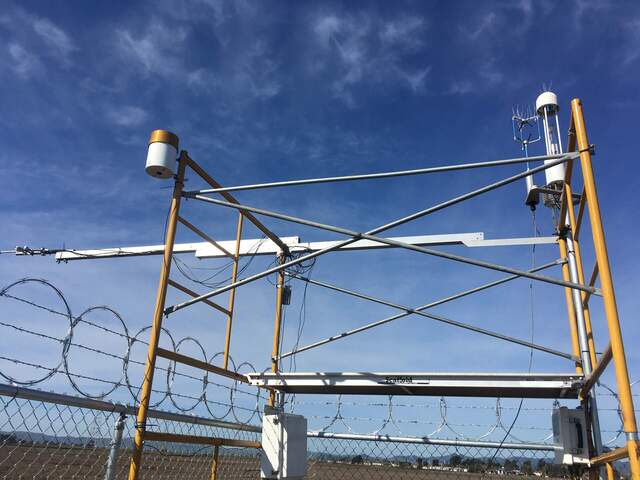 Precip bucket installed on the SE corner of the scaffolding, radiation boom pointing south, flux sensors on NW corner of scaffolding.