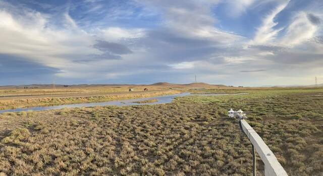 The ditch along the road is full to the brim with high tide