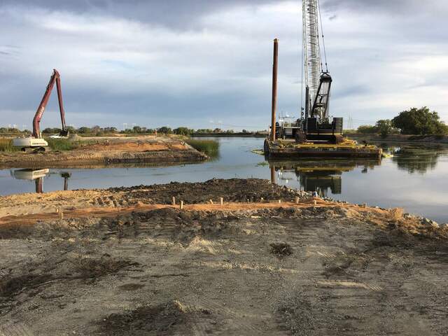 Tractors working at the Gilbert Tract breach site, maybe dredging the channel. This photo was taken 3 days after the breach.