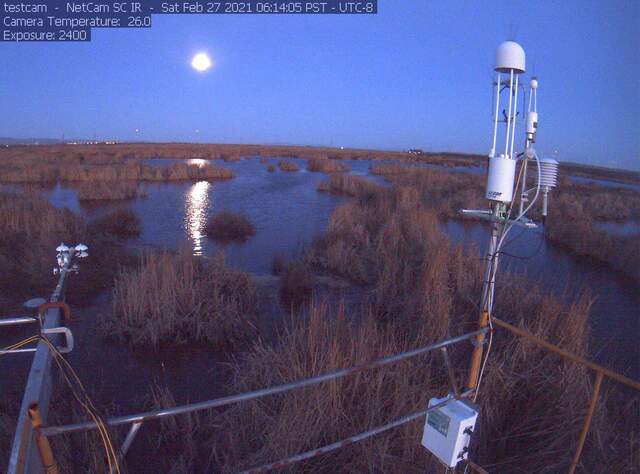 Full moon at dawn, radiometer intercomparison set up on rad boom