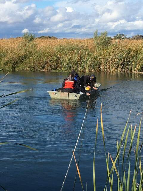 Robert, Koong, and Ari taking water samples and measuring flow during the 24hr tidal campaign