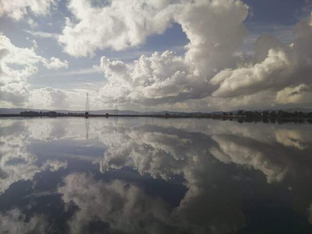 Amazing clouds reflected in water