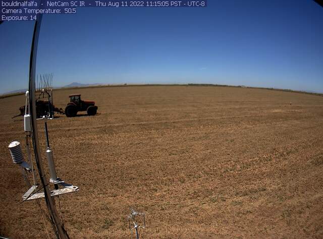 Tractor baling in progress