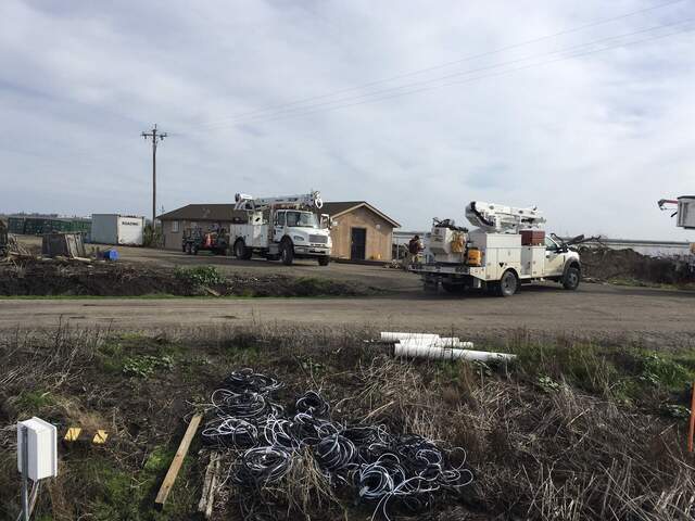 Power crews arrived on site to fix some downed poles from our recent spate of atmospheric river storms