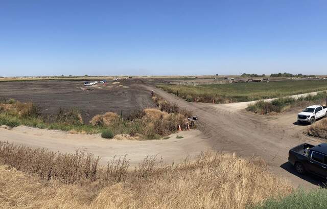 Huge borrow pit on the north side of Hwy 12 where they are getting soil for levee maintenance