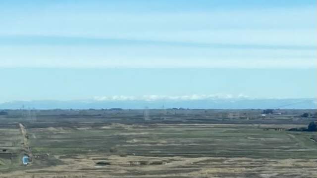 Snow in the Sierras from the top of the Antioch Bridge