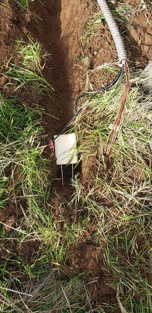 Soil heat flux and soil moisture sensor installation