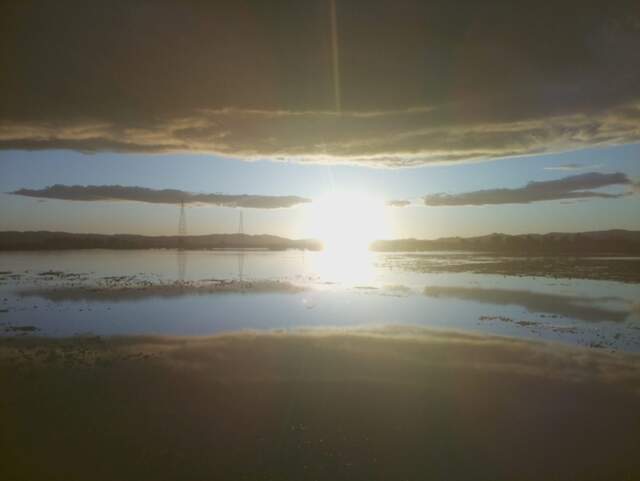 Sunset perfectly reflected in the water