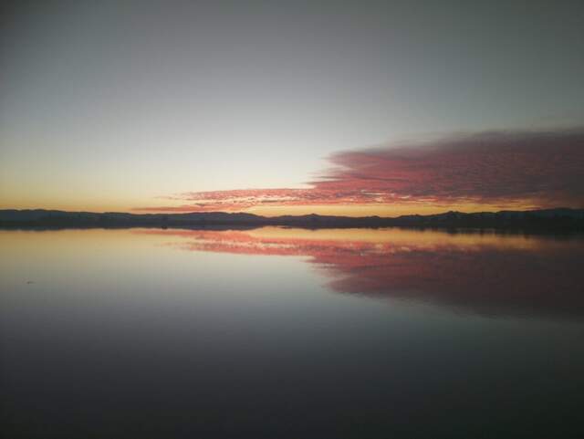 Nice sunset clouds reflected in the water